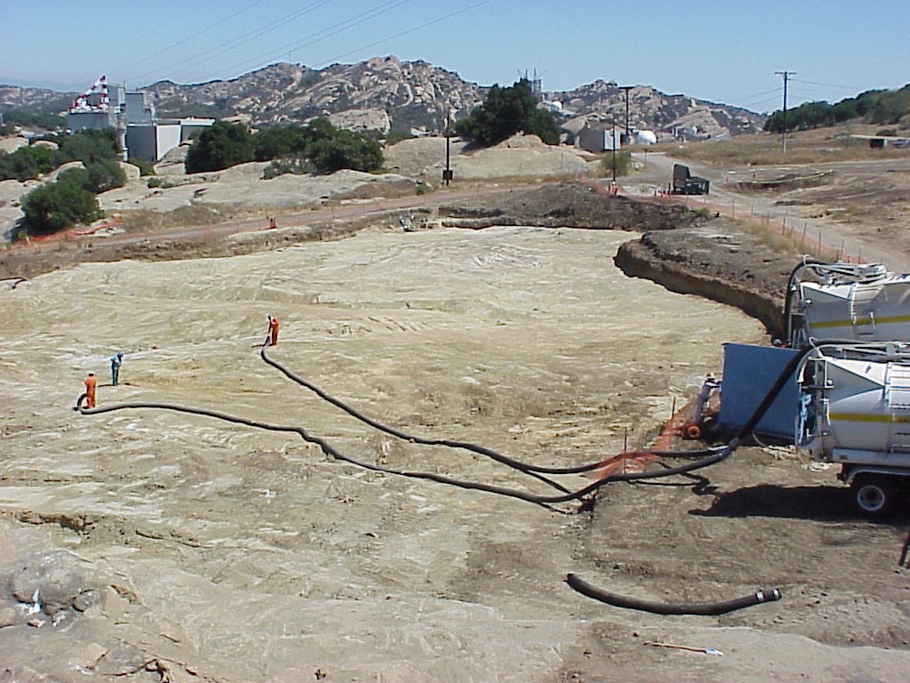 Excavating & vacuuming toxins July 2004.jpg